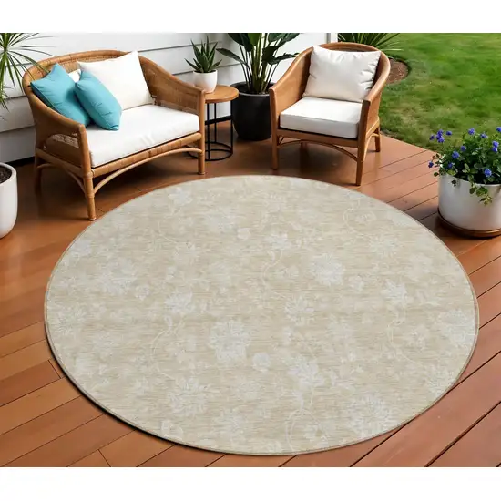 8' Beige Tan And Ivory Round Floral Washable Indoor Outdoor Area Rug Photo 1