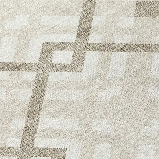 8' Beige Tan And Ivory Round Geometric Washable Indoor Outdoor Area Rug Photo 4