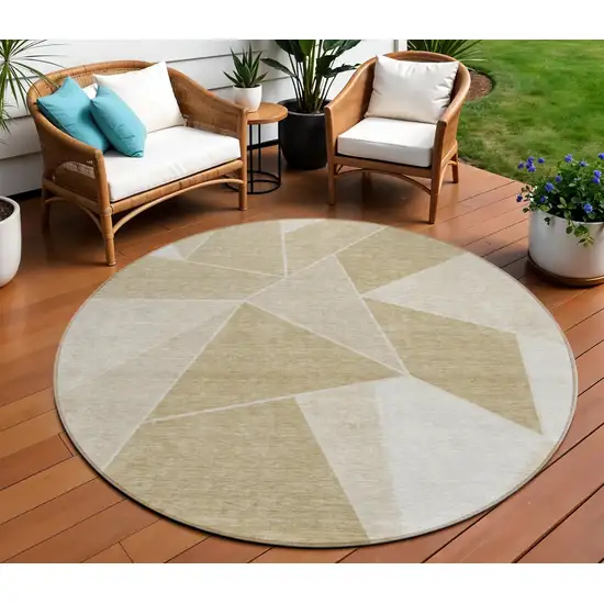 8' Beige Tan And Ivory Round Geometric Washable Indoor Outdoor Area Rug Photo 1