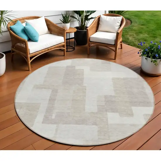 8' Beige Tan And Taupe Round Abstract Washable Indoor Outdoor Area Rug Photo 1