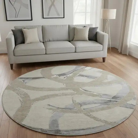 8' Beige Taupe And Gray Abstract Washable Round Rug With UV Protection Photo 2