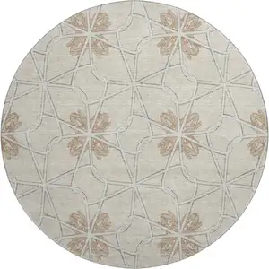 Photo of 8' Beige Taupe And Gray Geometric Washable Round Rug With UV Protection