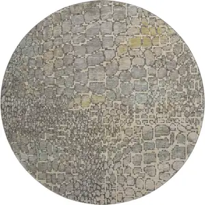 Photo of 8' Beige Taupe And Ivory Abstract Geometric Washable Round Rug With UV Protection