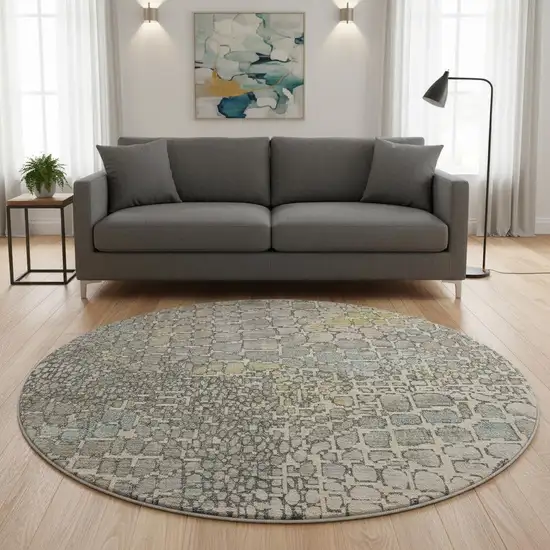 8' Beige Taupe And Ivory Abstract Geometric Washable Round Rug With UV Protection Photo 2