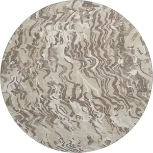 Photo of 8' Beige Taupe And Ivory Abstract Washable Round Rug With UV Protection