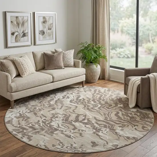 8' Beige Taupe And Ivory Abstract Washable Round Rug With UV Protection Photo 1