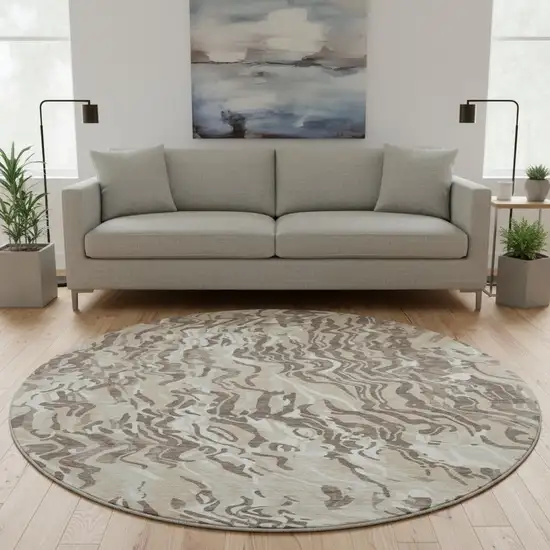8' Beige Taupe And Ivory Abstract Washable Round Rug With UV Protection Photo 2