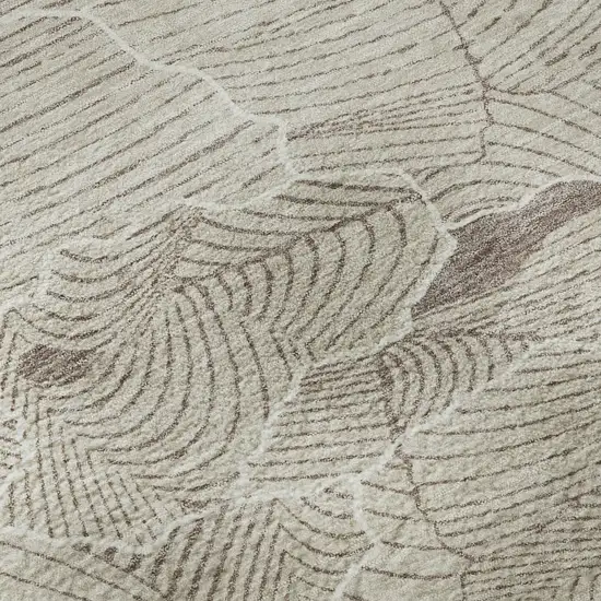 8' Beige Taupe And Ivory Abstract Washable Round Rug With UV Protection Photo 8