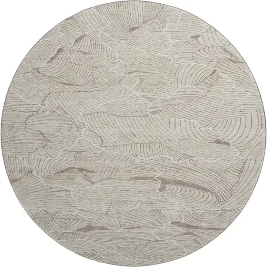 8' Beige Taupe And Ivory Abstract Washable Round Rug With UV Protection Photo 1