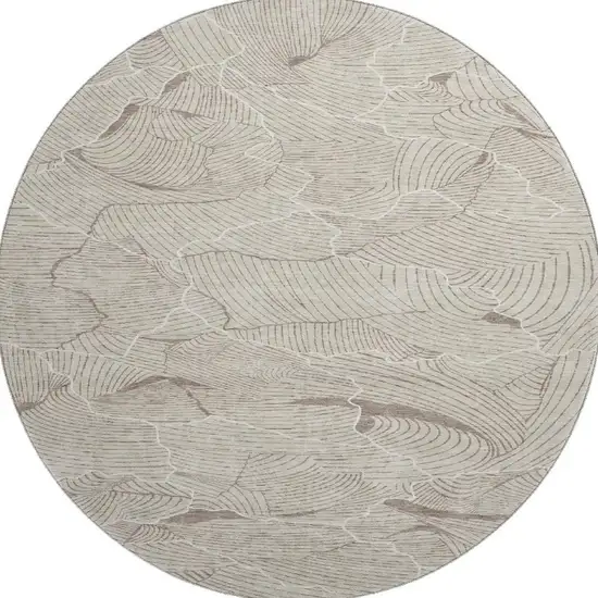 8' Beige Taupe And Ivory Abstract Washable Round Rug With UV Protection Photo 3