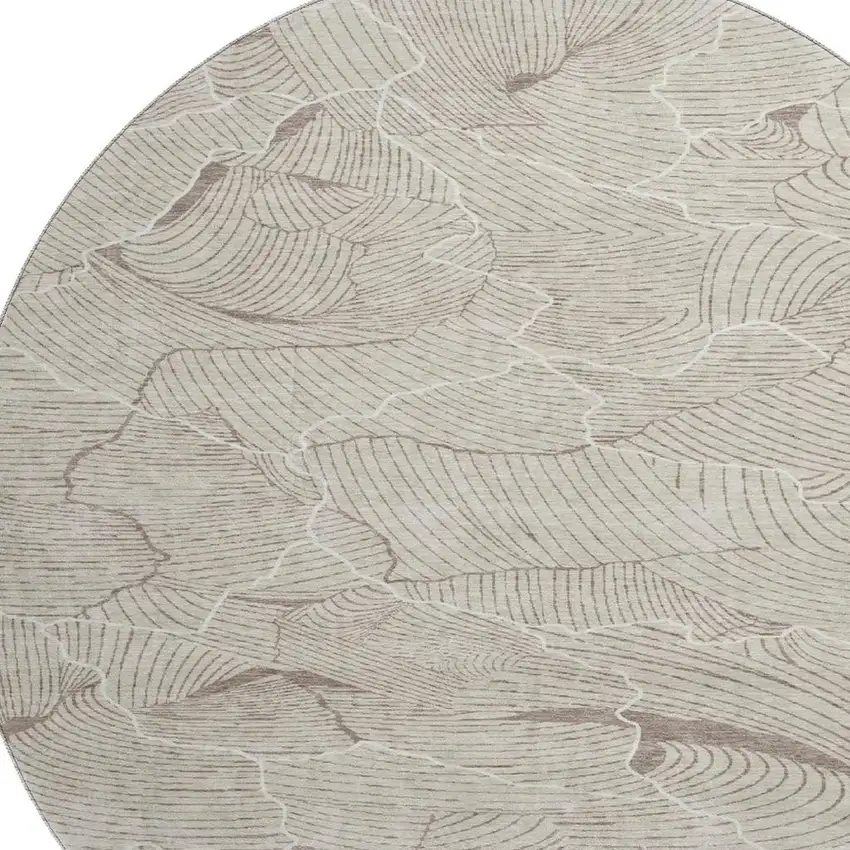 8' Beige Taupe And Ivory Abstract Washable Round Rug With UV Protection Photo 3