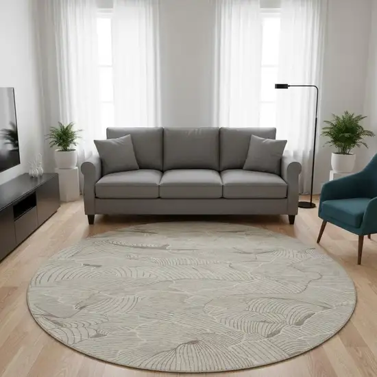 8' Beige Taupe And Ivory Abstract Washable Round Rug With UV Protection Photo 2