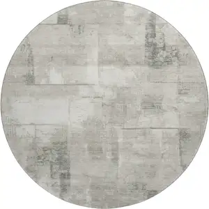 Photo of 8' Beige Taupe And Ivory Geometric Washable Round Rug With UV Protection