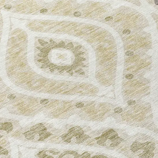 8' Beige Taupe And Ivory Round Floral Washable Indoor Outdoor Area Rug Photo 9