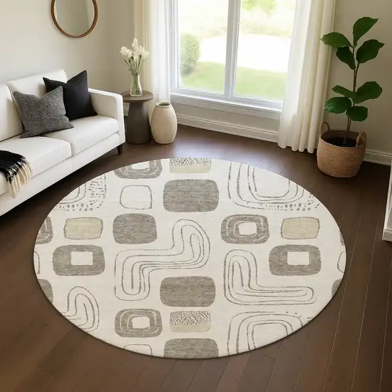 8' Beige Taupe And Khaki Geometric Washable Round Rug With UV Protection Photo 4