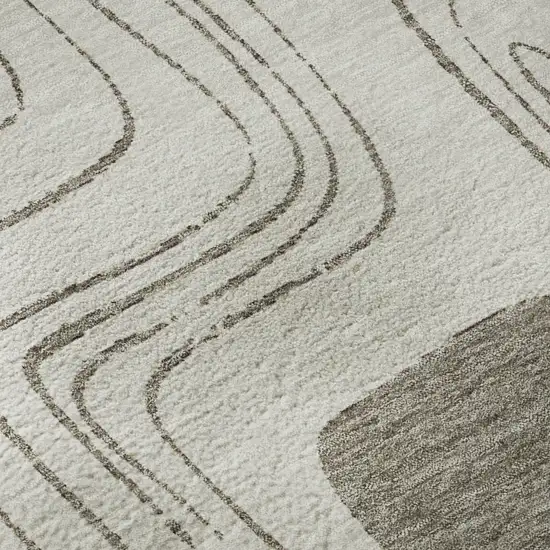 8' Beige Taupe And Khaki Geometric Washable Round Rug With UV Protection Photo 8