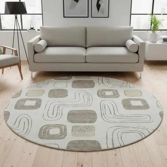 8' Beige Taupe And Khaki Geometric Washable Round Rug With UV Protection Photo 2