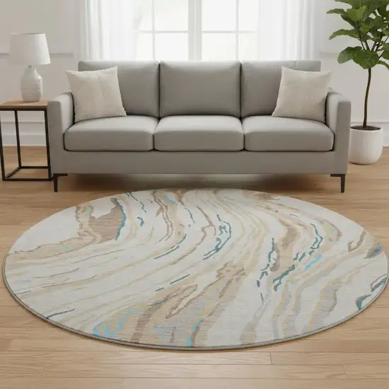 8' Beige Teal And Brown Abstract Washable Round Rug With UV Protection Photo 2
