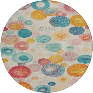 Photo of 8' Beige Teal Blue And Orange Round Geometric Washable Indoor Outdoor Area Rug