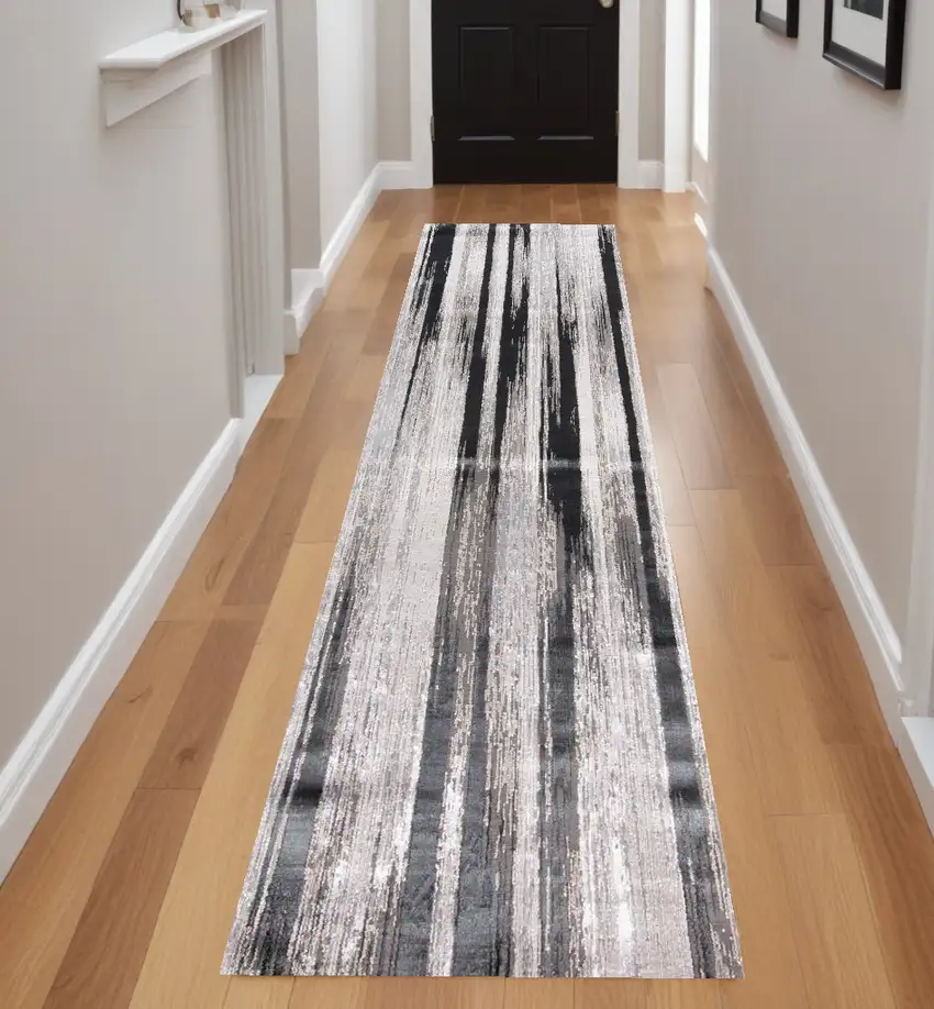 8' Beige and Black Abstract Power Loom Runner Rug Photo 1