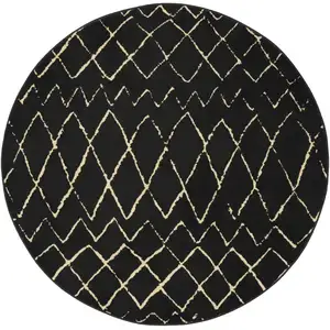 Photo of 5' Beige and Black Round Abstract Power Loom Area Rug
