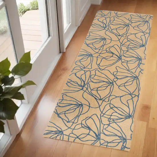 6' Beige and Blue Floral Washable Non Skid Area Rug With UV Protection Photo 1