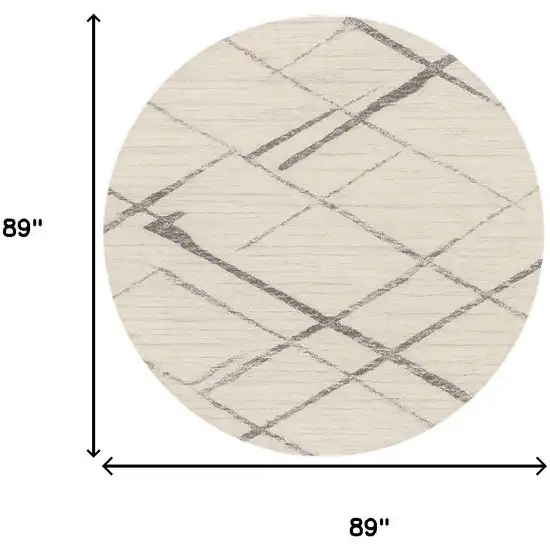 8' Beige and Gray Abstract Distressed Round Rug Photo 3