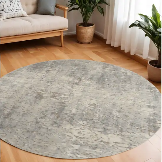 8' Beige and Gray Round Abstract Power Loom Area Rug Photo 1