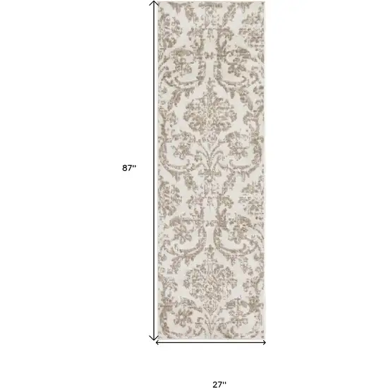 7' Beige and Ivory Damask Distressed Runner Rug Photo 3