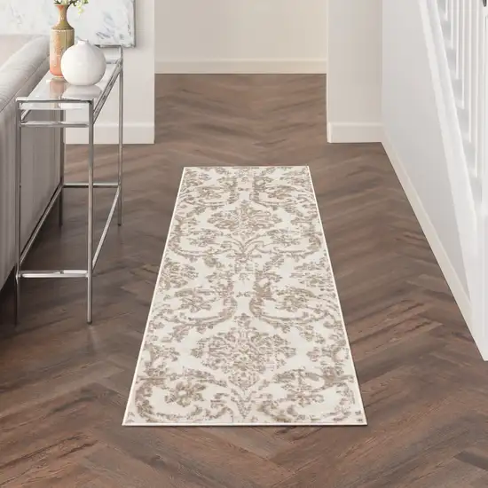 7' Beige and Ivory Damask Distressed Runner Rug Photo 3