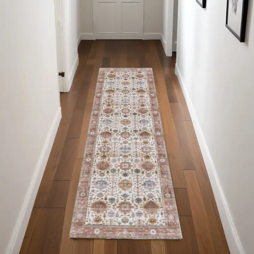 8' Beige and Orange Oriental Distressed Non Skid Runner Rug Photo 1