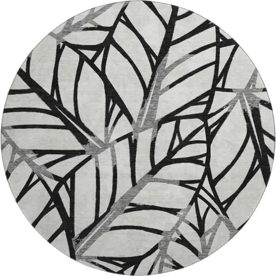 8' Black And Beige Floral Washable Round Rug With UV Protection Photo 1