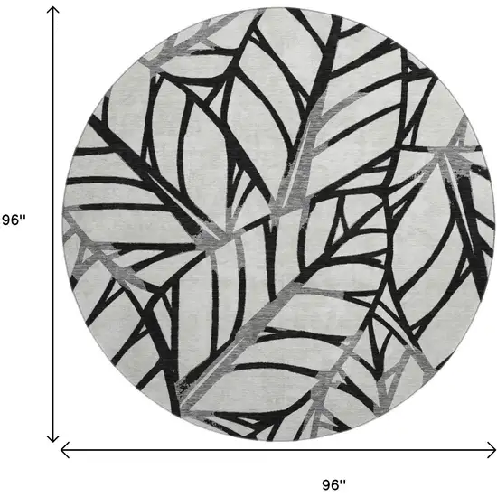 8' Black And Beige Floral Washable Round Rug With UV Protection Photo 3
