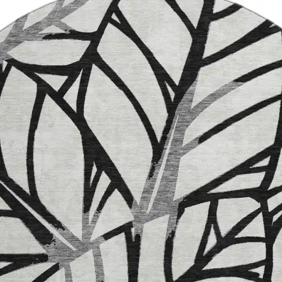 8' Black And Beige Floral Washable Round Rug With UV Protection Photo 3