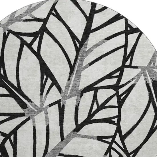 8' Black And Beige Floral Washable Round Rug With UV Protection Photo 4