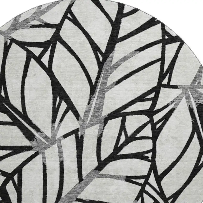 8' Black And Beige Floral Washable Round Rug With UV Protection Photo 4