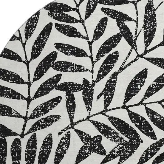 8' Black And Beige Floral Washable Round Rug With UV Protection Photo 3