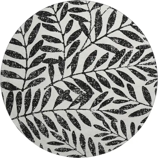 8' Black And Beige Floral Washable Round Rug With UV Protection Photo 1