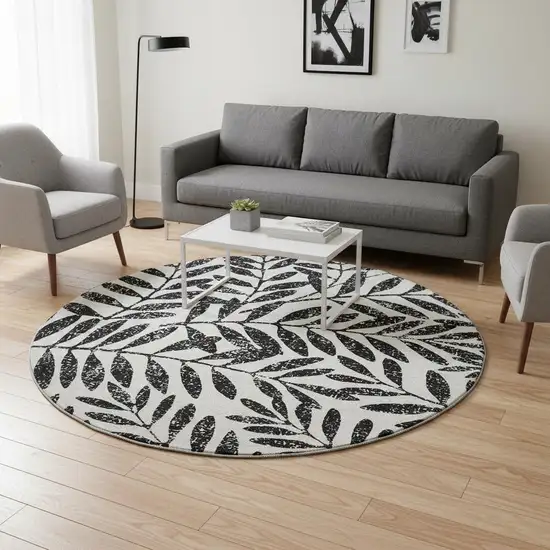 8' Black And Beige Floral Washable Round Rug With UV Protection Photo 2