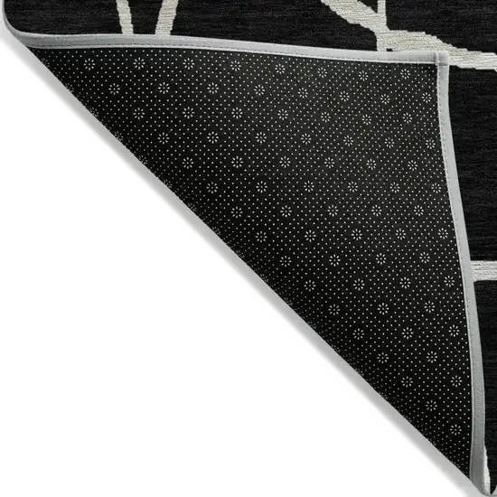 8' Black And Beige Round Abstract Washable Indoor Outdoor Area Rug Photo 5