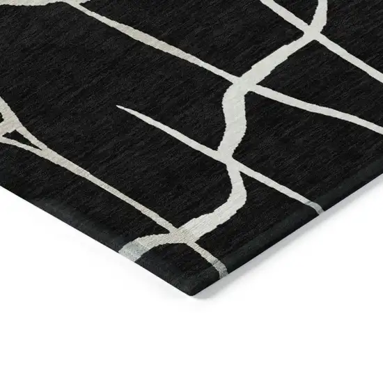 8' Black And Beige Round Abstract Washable Indoor Outdoor Area Rug Photo 3
