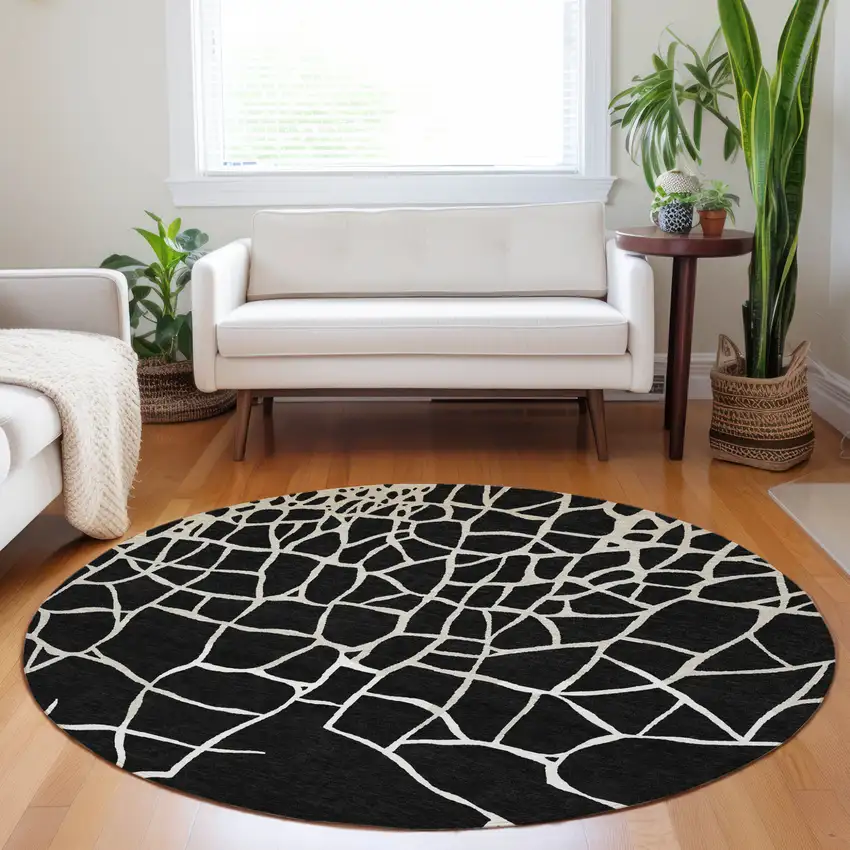 8' Black And Beige Round Abstract Washable Indoor Outdoor Area Rug Photo 9