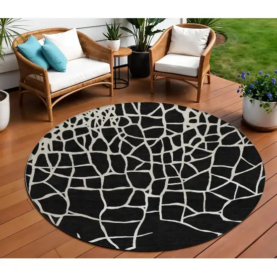 8' Black And Beige Round Abstract Washable Indoor Outdoor Area Rug Photo 1