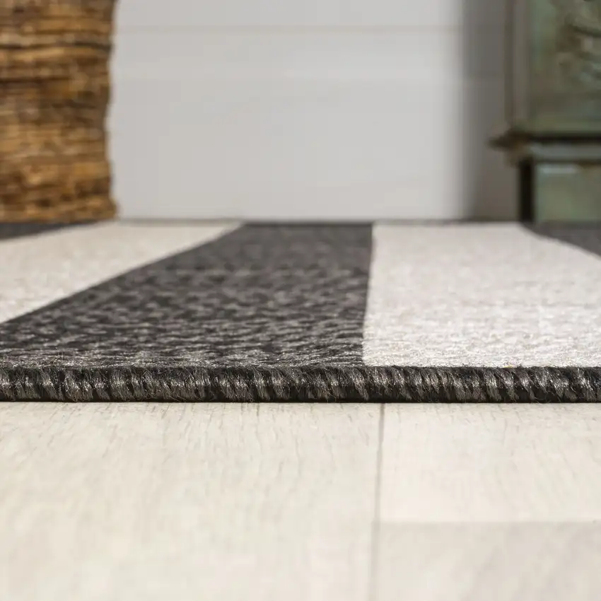8' Black And Beige Striped Indoor Outdoor Runner Rug Photo 9
