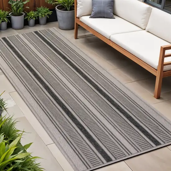8' Black And Beige Striped Indoor Outdoor Runner Rug Photo 1