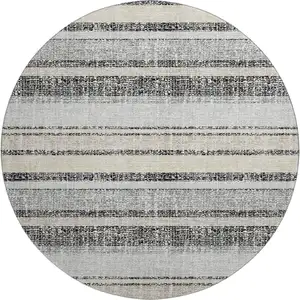 Photo of 8' Black And Beige Striped Washable Round Rug With UV Protection