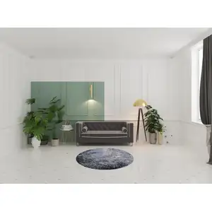 Photo of 5' Black And Blue Abstract Round Rug