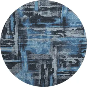 Photo of 8' Black And Blue Abstract Washable Round Rug With UV Protection