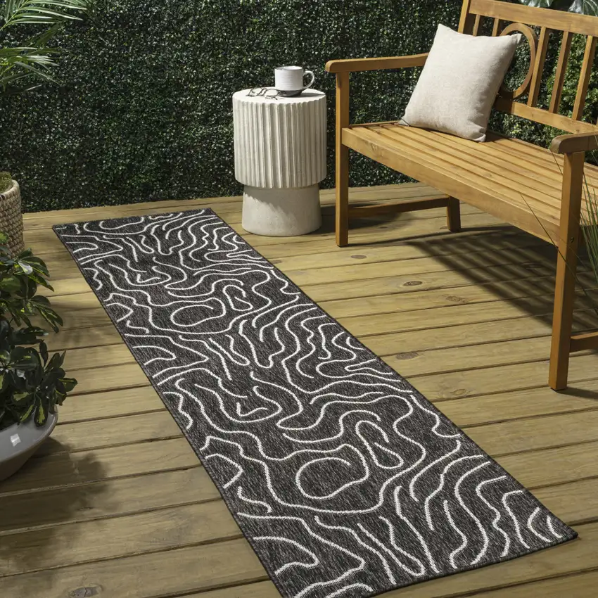 8' Black And Cream Abstract Indoor Outdoor Runner Rug Photo 5