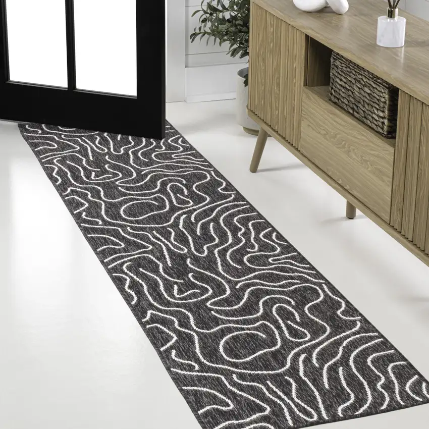 8' Black And Cream Abstract Indoor Outdoor Runner Rug Photo 4